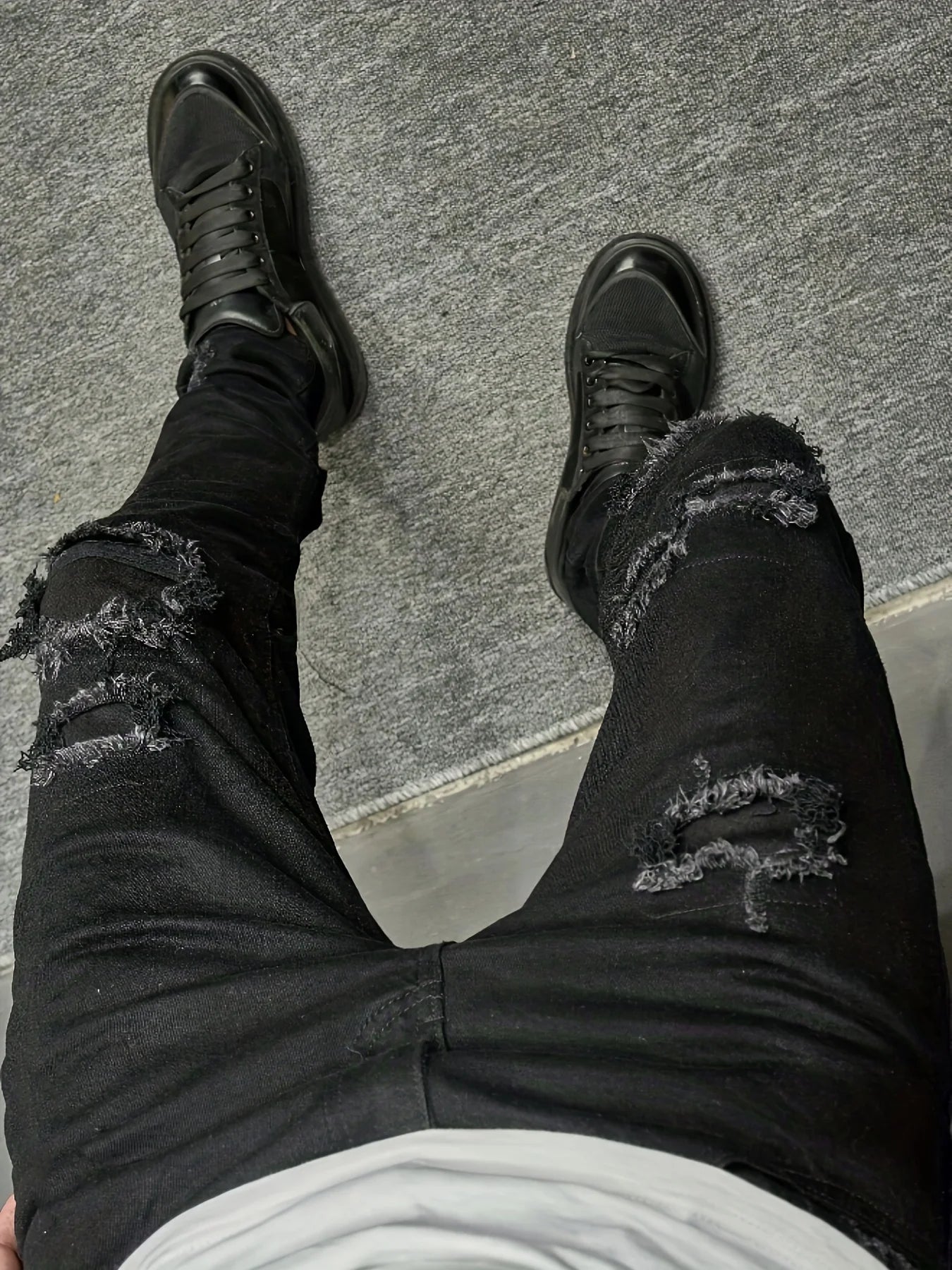 Men's slim fit jeans with torn